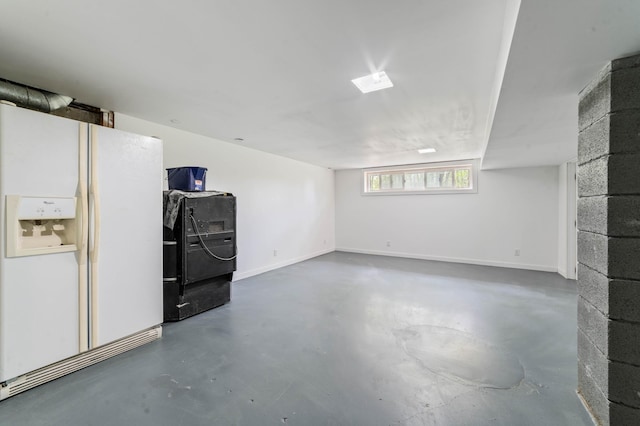 185 Wagon Rd, Esko, MN 55733 - below grade area with white fridge with ice dispenser
