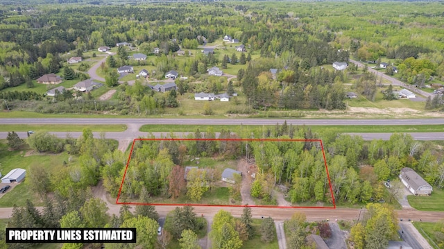 185 Wagon Rd, Esko, MN 55733 - aerial view of property and surrounding area with a heavily wooded area and property boundaries highlighted