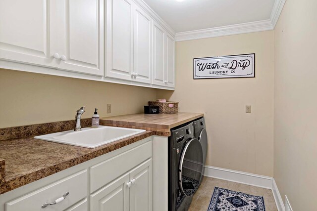 75 Oregon Ave S, Golden Valley, MN 55426 - washroom with washer and dryer, light tile patterned floors, cabinet space, baseboards, and ornamental molding
