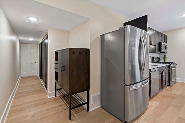 75 Oregon Ave S, Golden Valley, MN 55426 - kitchen with stainless steel appliances, light wood-type flooring, light countertops, and baseboards