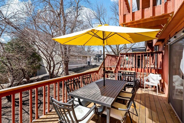75 Oregon Ave S, Golden Valley, MN 55426 - wooden deck with outdoor dining area