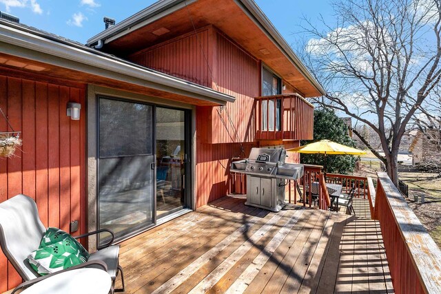 75 Oregon Ave S, Golden Valley, MN 55426 - wooden deck with a grill