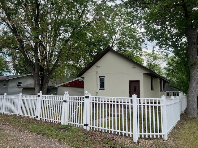 103 31st Ave N, Saint Cloud, MN 56303 - view of property exterior with stucco siding