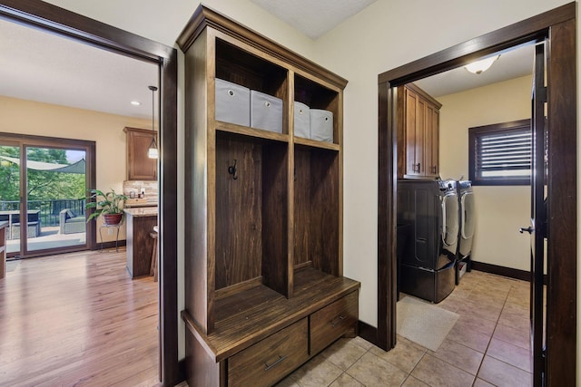 227 Maple Ln, Jordan, MN 55352 - mudroom featuring washer and clothes dryer, baseboards, light tile patterned flooring, and recessed lighting
