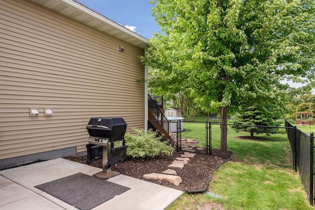 227 Maple Ln, Jordan, MN 55352 - view of yard featuring stairway, a gate, and a patio