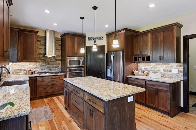 227 Maple Ln, Jordan, MN 55352 - kitchen featuring stainless steel appliances, wall chimney range hood, a sink, tasteful backsplash, and recessed lighting