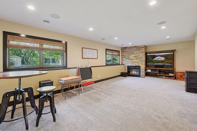 227 Maple Ln, Jordan, MN 55352 - sitting room with carpet flooring, recessed lighting, baseboards, and a fireplace