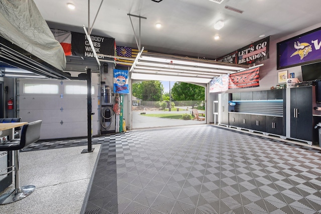 227 Maple Ln, Jordan, MN 55352 - garage featuring recessed lighting