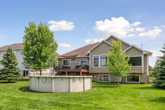 227 Maple Ln, Jordan, MN 55352 - back of house featuring a wooden deck, a yard, and an outdoor pool