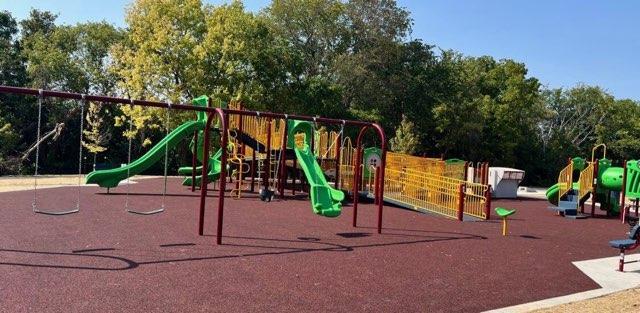 227 Maple Ln, Jordan, MN 55352 - community jungle gym featuring view of scattered trees