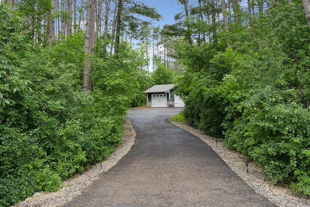 13171 Island View Dr NW, Elk River, MN 55330 - view of front of house featuring an outbuilding and driveway