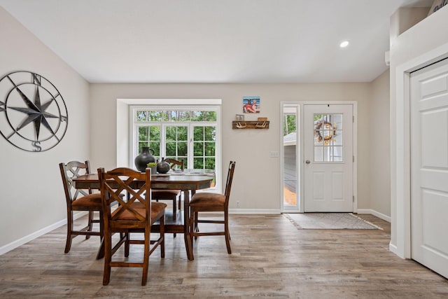 13171 Island View Dr NW, Elk River, MN 55330 - dining space with wood finished floors and recessed lighting