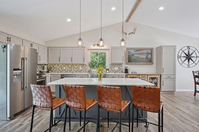 13171 Island View Dr NW, Elk River, MN 55330 - kitchen featuring stainless steel appliances, light countertops, backsplash, and recessed lighting