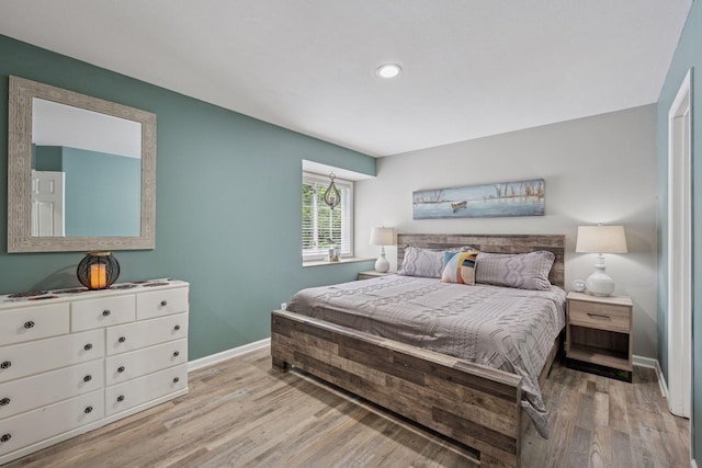 13171 Island View Dr NW, Elk River, MN 55330 - bedroom with wood finished floors and recessed lighting