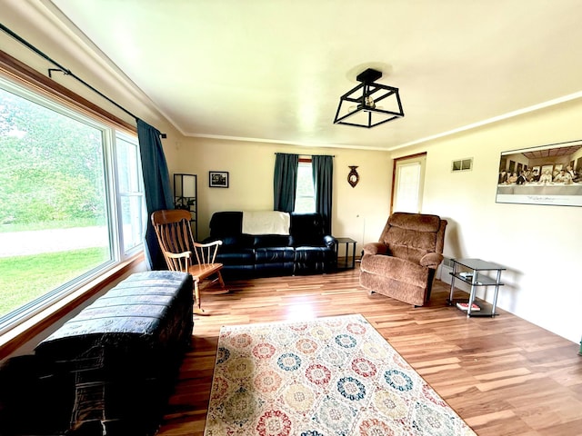 1402 Kirkwood Ave, Albert Lea, MN 56007 - living area with wood finished floors and crown molding
