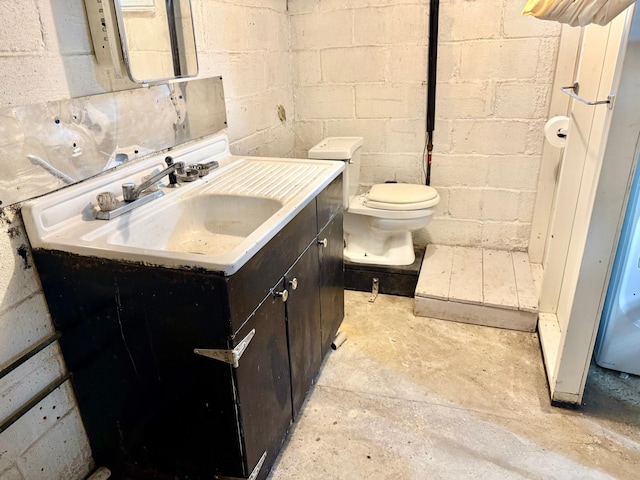 1402 Kirkwood Ave, Albert Lea, MN 56007 - bathroom featuring vanity, toilet, and unfinished concrete flooring