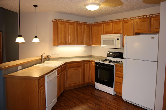 7642 Palisades Ave NE, Otsego, MN 55330 - kitchen featuring white appliances, a sink, a peninsula, light countertops, and dark wood-type flooring