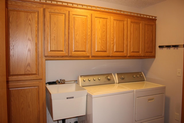 7642 Palisades Ave NE, Otsego, MN 55330 - laundry area with cabinet space and independent washer and dryer