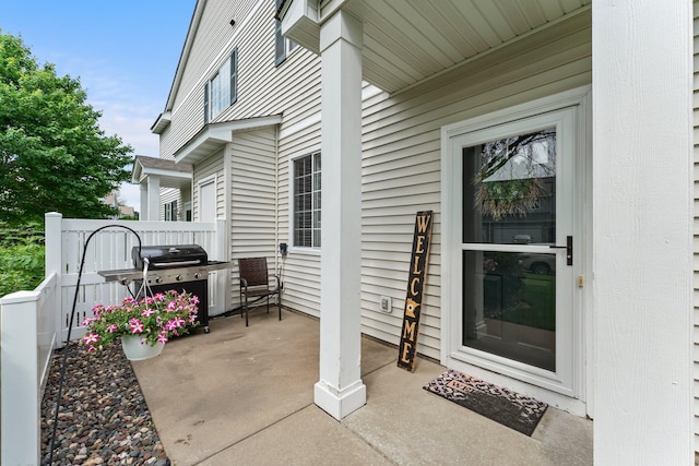 13055 Europa Trail Way N Unit A, Hugo, MN 55038 - doorway to property featuring a patio area