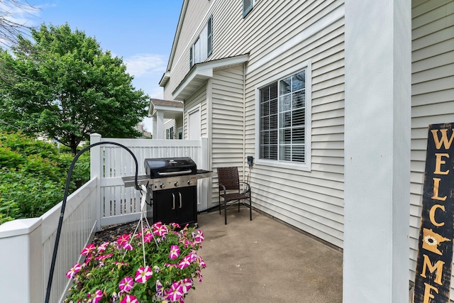 13055 Europa Trail Way N Unit A, Hugo, MN 55038 - view of patio with a grill