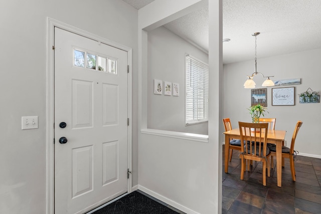 13055 Europa Trail Way N Unit A, Hugo, MN 55038 - entryway featuring baseboards and a textured ceiling
