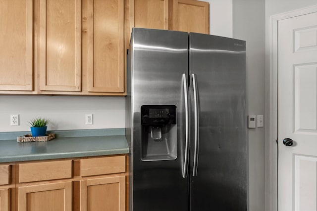 13055 Europa Trail Way N Unit A, Hugo, MN 55038 - kitchen featuring stainless steel fridge with ice dispenser and light brown cabinets