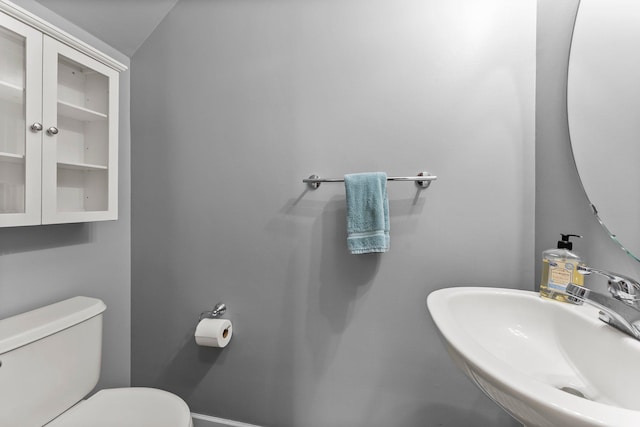13055 Europa Trail Way N Unit A, Hugo, MN 55038 - bathroom with a sink, toilet, and baseboards