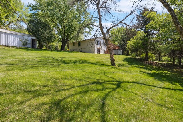 2820 150th St W, Shakopee, MN 55379 - view of green lawn with a pole building and an outbuilding