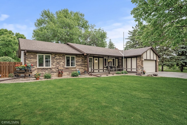 10425 Quaker Ln N, Maple Grove, MN 55369 - ranch-style house with a porch, brick siding, driveway, a garage, and a shingled roof