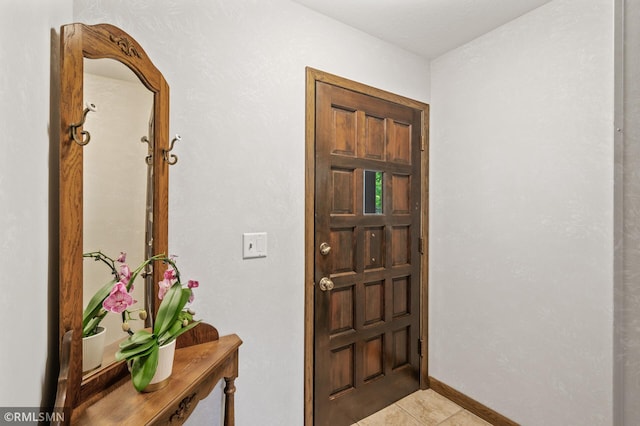 10425 Quaker Ln N, Maple Grove, MN 55369 - entryway featuring light tile patterned flooring and baseboards