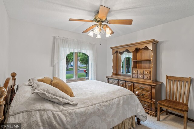 10425 Quaker Ln N, Maple Grove, MN 55369 - bedroom with carpet and ceiling fan