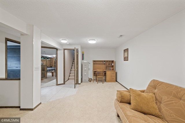 10425 Quaker Ln N, Maple Grove, MN 55369 - sitting room with light carpet, stairs, light tile patterned flooring, and baseboards