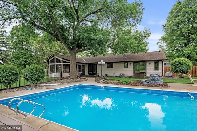 10425 Quaker Ln N, Maple Grove, MN 55369 - outdoor pool featuring a sunroom
