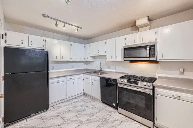 8932 Neill Lake Rd Unit 112B, Eden Prairie, MN 55347 - kitchen with black appliances, a sink, light marble finish flooring, and white cabinets