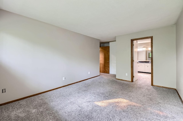8932 Neill Lake Rd Unit 112B, Eden Prairie, MN 55347 - spare room featuring carpet and baseboards