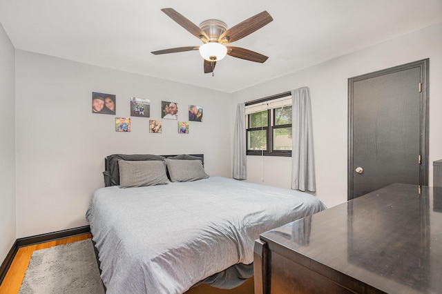4101 Welcome Ave N, Robbinsdale, MN 55422 - bedroom featuring wood finished floors and a ceiling fan