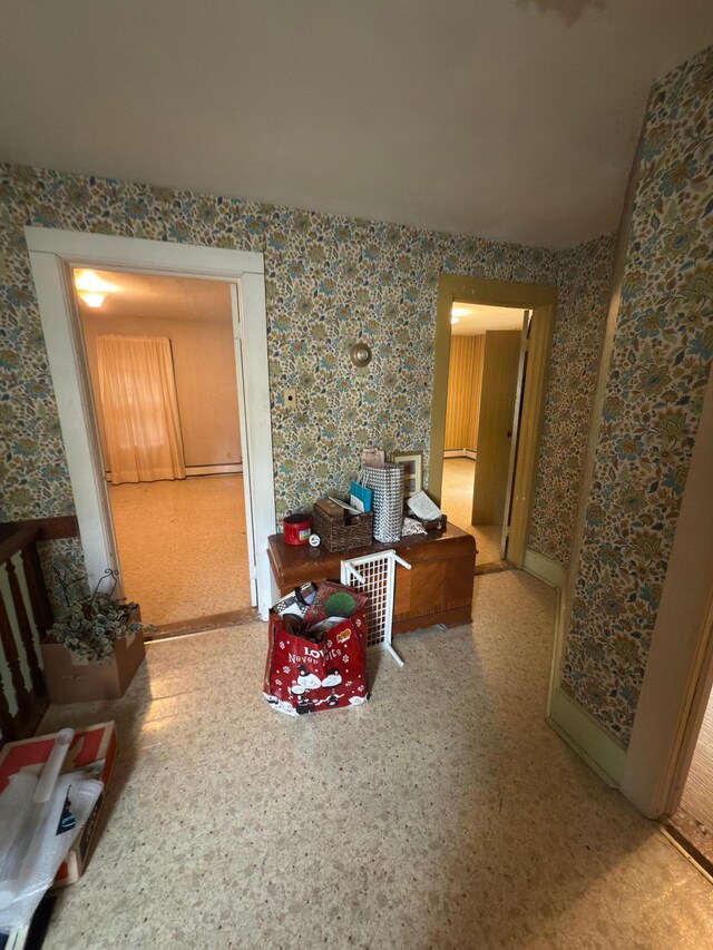 107 3rd Ave, Bellingham, MN 56212 - living room with wallpapered walls and baseboards