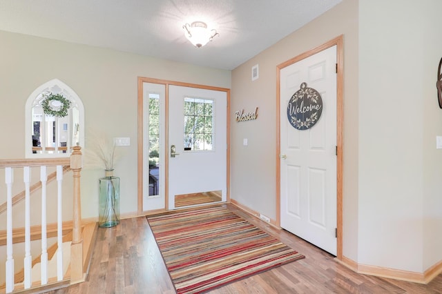 2301 170th Ln NW, Andover, MN 55304 - entrance foyer with wood finished floors and baseboards