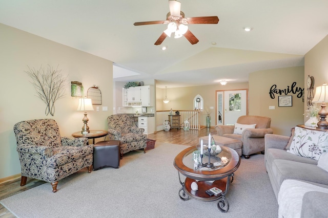 2301 170th Ln NW, Andover, MN 55304 - living room with a ceiling fan, vaulted ceiling, and light wood-style flooring