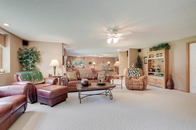2301 170th Ln NW, Andover, MN 55304 - living area featuring ceiling fan, carpet flooring, and a textured ceiling