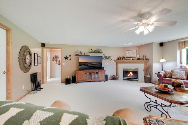 2301 170th Ln NW, Andover, MN 55304 - carpeted living room featuring a glass covered fireplace and a ceiling fan