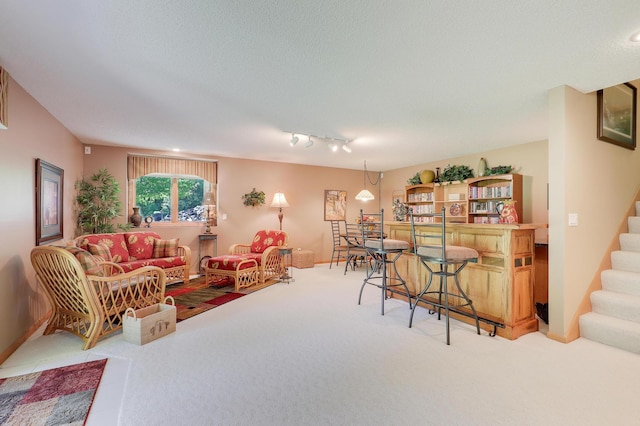2301 170th Ln NW, Andover, MN 55304 - carpeted living room featuring stairway and baseboards