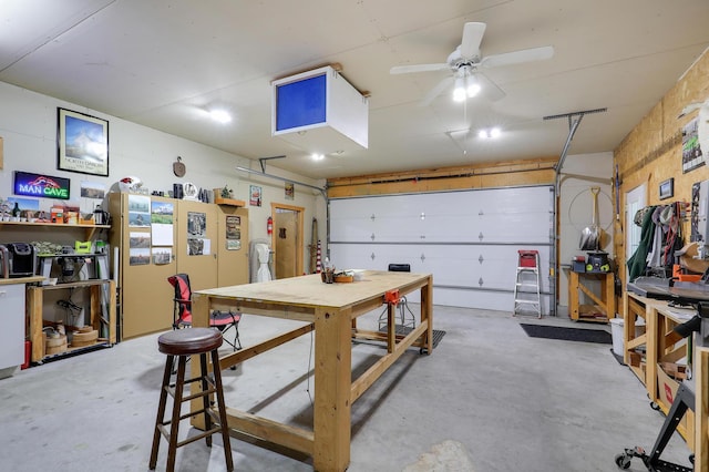 2301 170th Ln NW, Andover, MN 55304 - garage featuring a workshop area and a ceiling fan