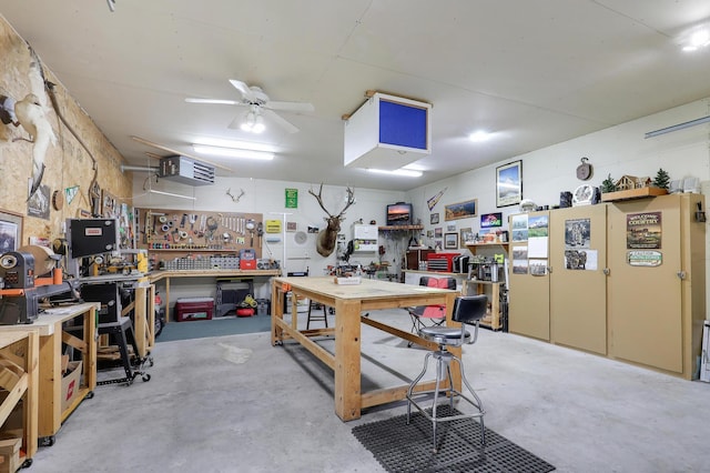 2301 170th Ln NW, Andover, MN 55304 - miscellaneous room with a workshop area, concrete floors, and a ceiling fan