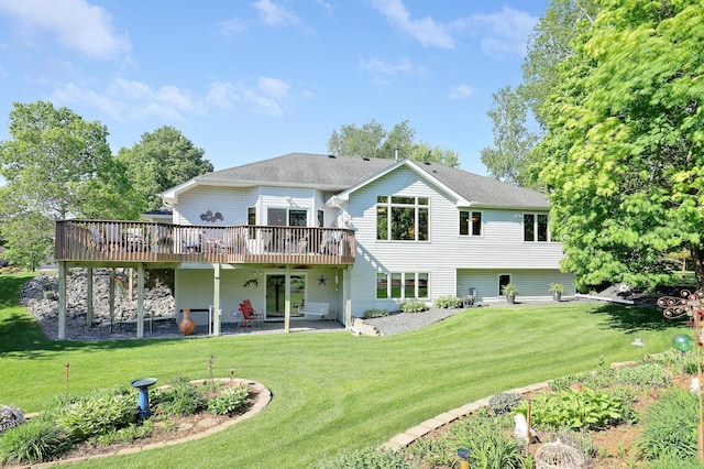 2301 170th Ln NW, Andover, MN 55304 - back of property with a deck, a yard, and roof with shingles