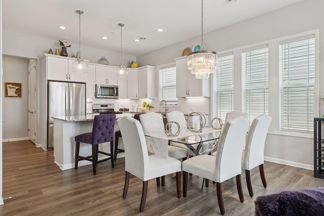 8094 Arrowwood Ln N, Maple Grove, MN 55369 - dining room with recessed lighting, dark wood-style floors, baseboards, and a chandelier