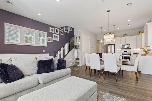 8094 Arrowwood Ln N, Maple Grove, MN 55369 - living area featuring stairway, dark wood finished floors, a chandelier, and recessed lighting