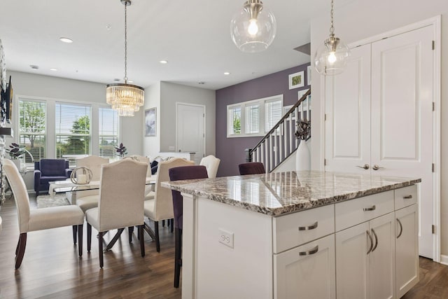 8094 Arrowwood Ln N, Maple Grove, MN 55369 - kitchen with dark wood-style floors, healthy amount of natural light, white cabinetry, decorative light fixtures, and recessed lighting