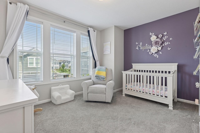 8094 Arrowwood Ln N, Maple Grove, MN 55369 - carpeted bedroom featuring a crib and baseboards