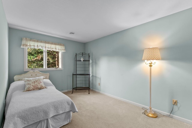 674 Mound Ave, Shoreview, MN 55126 - bedroom featuring light colored carpet and baseboards